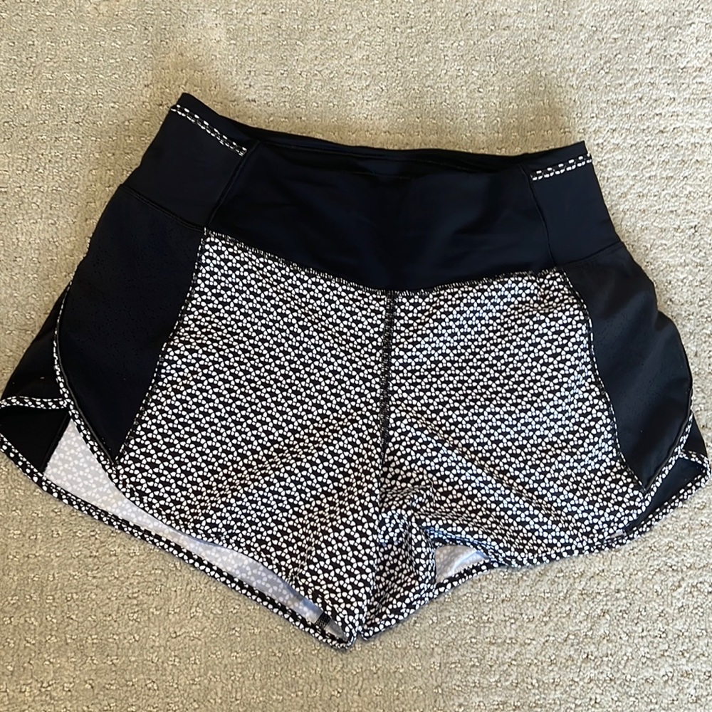 Lululemon women's running shorts. In perfect shape. Size 4.